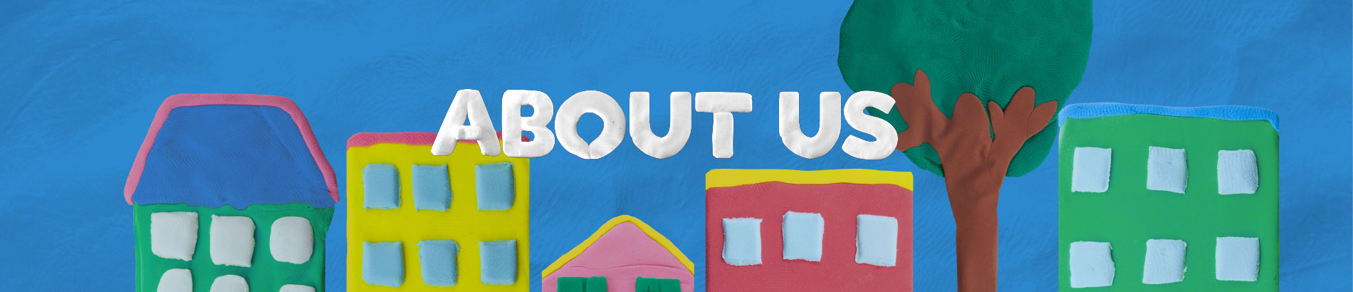 Banner of plasticine houses in the background of the page heading: About us